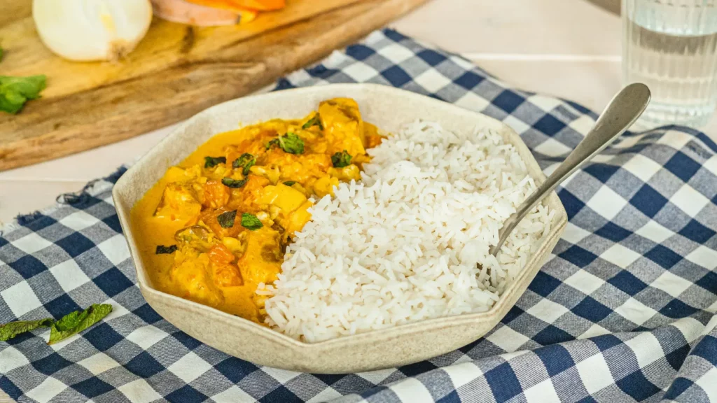 Riso al curry con merluzzo carbonaro e zucca: la ricetta